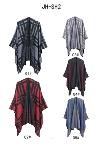 Detail view of five different color options for knit star pattern ponchos and shawls