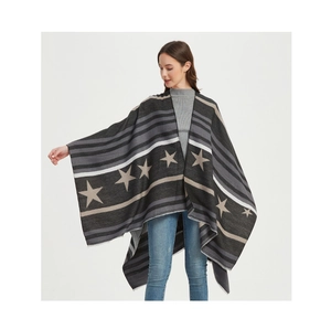 Detailed knit texture of a star pattern shawl wrap with elegant striped borders