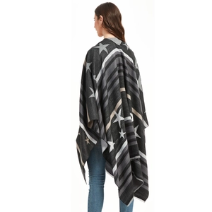 Women's dark grey knit poncho shawl with large star patterns and fringe hem details