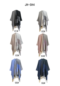 Matrix display of six colorful geometric jacquard shawls with fringe and wide stripes