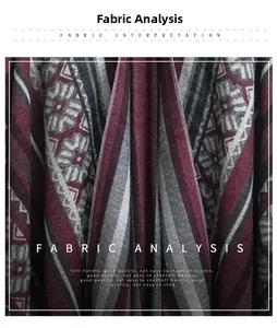 Detail of soft knit geometric jacquard fabric with wine red and grey ethnic patterns