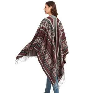 Bohemian geometric jacquard tassel shawl with ethnic patterns for women shown from the back