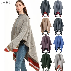 Women's plaid tassel poncho shawl wrap with split hem available in 8 classic colors