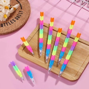 Rainbow building block pencils with multi-colored stackable segments and protective caps