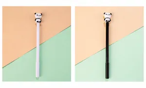 Detail view of cute 3D panda silicone toppers on black and white gel pens
