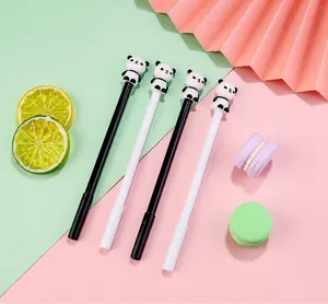 Detail view of 0.5mm panda gel pens featuring 3D cartoon toppers on a pastel background