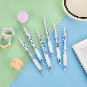 Detailed macro view of six retractable bear themed craft knife pens for DIY scrapbooking