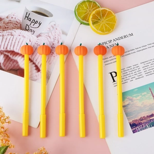 6-pack of cute orange pumpkin top gel pens for Halloween on a minimalist pink background
