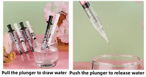 Close-up of syringe-shaped gel pen featuring volume scale and cute cartoon prints