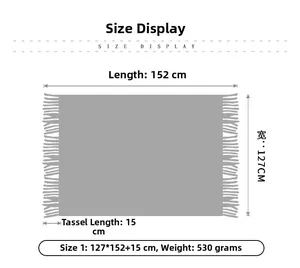 Size chart showing 127x152cm dimensions with 15cm fringe details for the knitted blanket