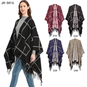 Women's plaid tassel poncho cape with check pattern available in multiple colors