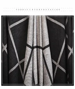 Close-up of soft plaid fabric texture and geometric pattern of the women poncho