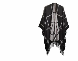 Detailed close-up of dark grey checkered pattern and fringe on women's knit shawl