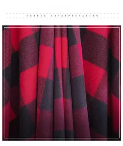 Close-up of thick red and black buffalo plaid flannel fabric with soft brushed texture