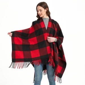 Cozy red and black buffalo plaid knitted poncho cape with elegant fringe tassels
