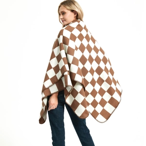 Brown and white checkerboard knit shawl wrap for women shown on model over a white background