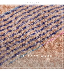 Macro shot of soft knit fabric with pastel stripes showcasing light and warm texture