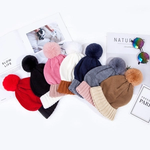 Kids chunky knit beanie with pom-pom in various colors for autumn and winter warmth