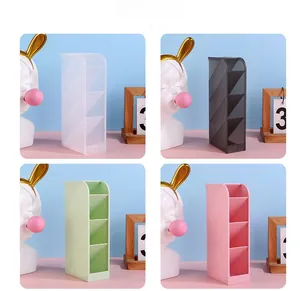 Detail showing diagonal four-slot desk organizers in frosted white, gray, green, and pink
