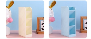 Detail view of multi-compartment slanted desk organizers in beige and light blue colors