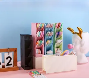 Detail of multi-compartment diagonal desk organizer showing five color options in plastic