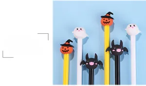 Detail of Halloween gel pens with cute pumpkin, ghost, and bat silicone character toppers