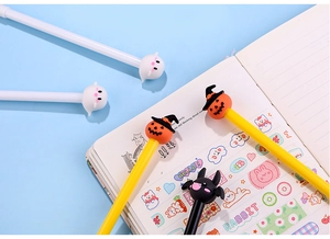 Creative Halloween gel pens with cute pumpkin and ghost toppers on a blue background