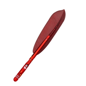 Red Christmas feather pen with snowman patterns and Merry Christmas text on white background