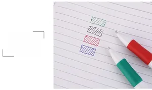 Detail showing red, black, blue, and green ink strokes from a 4-in-1 retractable pen