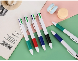 Detail of multi-color retractable ballpoint pens with soft ergonomic grips and 4-color switch