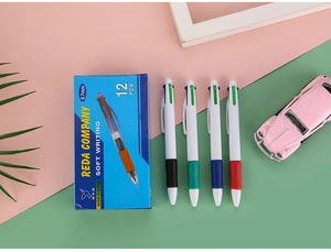 Detail view of 4-color retractable ballpoint pens with rubber grip in 12-piece blue box