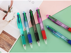 Detail of 4-color retractable ballpoint pens with ergonomic rubber grips and transparent barrels