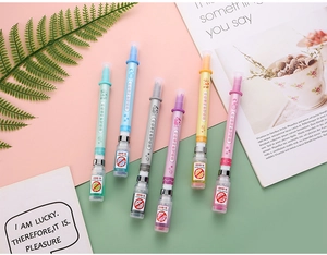 Detail view of 6-color syringe-shaped gel pens with COVID-19 vaccine theme and lettering
