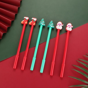 Set of six festive Christmas gel pens featuring silicone Santa and tree motifs