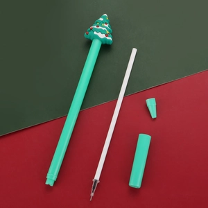 Disassembled Christmas tree gel pen set with mint green barrel and silicone topper