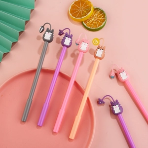 Lot de stylos gel colorés avec pendentifs hamsters mignons pour étudiants sur fond rose