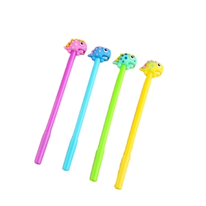 Set of four colorful cartoon dinosaur gel pens in pink blue green and yellow for students