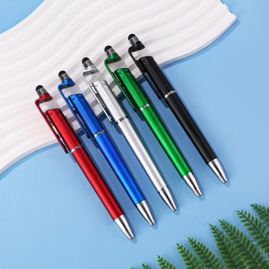 Close-up of multi-functional stylus pens in five colors used as mobile phone stands