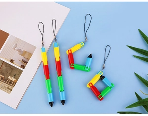 Creative folding ballpoint pens with colorful segments and lanyards on a blue background