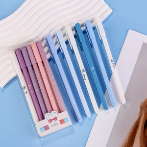 Detailed shot of pastel gel pens set with hearts and Korean letters in clear case