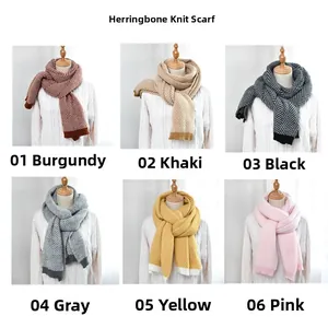 Close-up of herringbone knit scarves in six colors including burgundy, grey and pink