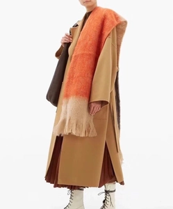 Chic long thick scarf with warm orange to beige gradient and stylish fringe details
