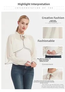 Detail of cream chiffon sun shawl featuring polka dot trim and elastic thumb loops