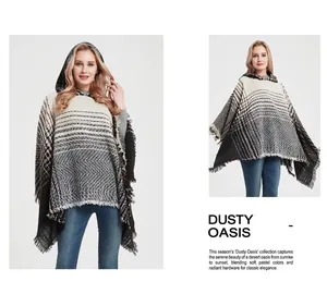 Detail of hooded knit poncho with striped gradient pattern and fringe hem for women