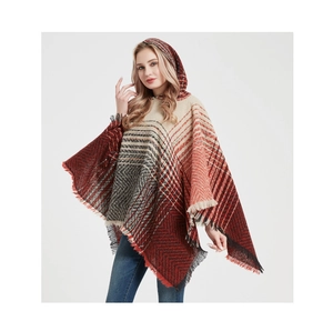 Detail of hooded poncho featuring multi-color plaid pattern and fine fringe hem