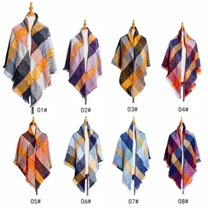 Detail view of eight colorful thick plaid scarves with soft fringes and brushed texture