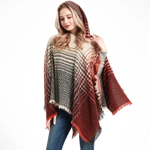 Women's autumn hooded poncho with red and grey herringbone knit and tassel details