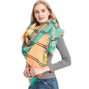 Thick autumn winter oversized plaid scarf with tassels in orange and green check