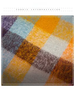 Close-up of thick plaid boucle scarf fabric showing soft colorful yarn texture