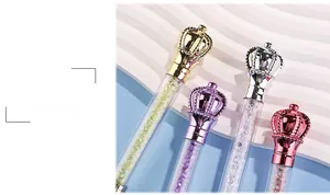 Detailed view of crown-topped pens with sparkling crystal filling in four metallic colors